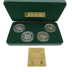 Three Pobjoy Mint Isle of Man proof sterling silver coin sets comprising five one crown coins, dated 1979, seven coin set, from half penny to one pound and four crowns, commemorating the 1980 Olympics, all cased with certificates (3)