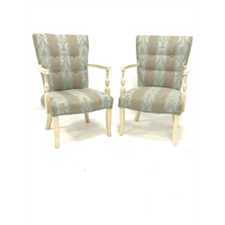 Pair of French style painted hardwood open armchairs, upholstered in striped floral fabric, raised on square splayed supports, W56cm