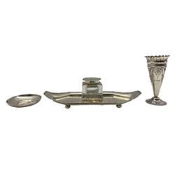 Silver rectangular inkstand with presentation inscription and glass block inkwell with silver cover L24cm Sheffield 1913 Maker Lee & Wigfull, embossed silver trumpet shape vase H12cm London 1900 and a saucer dish inscribed 'Government House, Hong Kong 1932' D8cm 