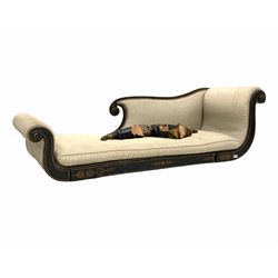 Regency ebonised chaise longue of scrolling form, the frame with gilt painted details, upholstered in striped fabric with squab cushion, raised on turned supports with castors W190cm