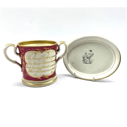 George IV Staffordshire pottery loving cup with gilt verse and  inscription Presented to William Llewellyn Born Jan 27th 1828, H12cm together with an early 19th century Bat Printed oval teapot stand decorated with a Mother and Child (2)