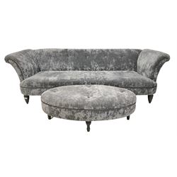 Grande sofa upholstered in crushed velvet fabric, with matching stool, raised on turned supports 