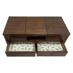 Hardwood coffee table, rectangular top with hinged lids to each end concealing compartment, fitted with two drawers, on chamfered feet