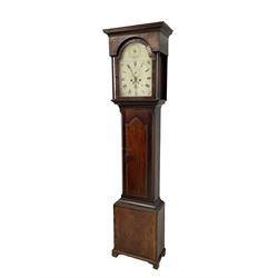 Mahogany -  early 19th century 8-day longcase clock, with a flat topped pediment and break arch door beneath, trunk with canted corners and a long trunk door with inlay and a break arch top on a rectangular plinth with bracket feet, predominantly white painted dial with gilt decoration to the spandrels, Roman numerals and minute track, seconds dial and calendar aperture, strike/silent feature to the arch, dial pinned via a false plate to a rack striking movement striking the hours on a bell. With weights and pendulum. Makers name indistinct but makers workplace given as Bladon.