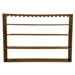 'Oakleafman' oak open plate rack, fretwork arcade cresting rail over four shelves, adzed upright supports, carved with leaf signature, by David Langstaff of Easingwold