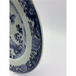 Two 18th century Chinese Export blue and white plates, each decorated with terrace scenes with flowers and butterflies, D23.5cm (2)
