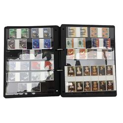 Queen Elizabeth II mostly commemorative mint stamps, including first class, face value of useable postage approximately 340 GBP