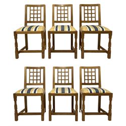 Knightman - set of six oak dining chairs, lattice back over upholstered drop-in seat, on octagonal front supports united by H-shaped stretchers, by Horace Knight, Balk, Thirsk