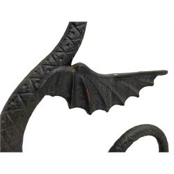 Cast iron bench ends in the form of winged dragons