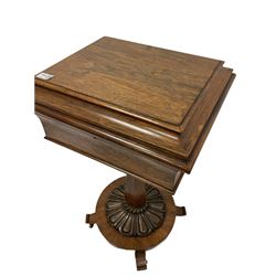 William IV rosewood teapoy or work box, cavetto moulded hinged lid revealing a cushion upholstered interior, the box on slender faceted vase shaped column, circular platform with lobe carved mounts, splayed feet with brass castors