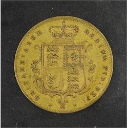 Queen Victoria 1872 gold half sovereign coin, die number 75, housed in a display case