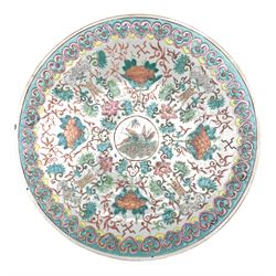 19th century Chinese charger with a centre panel of insects, surrounded by flowers within a turquoise border D38cm