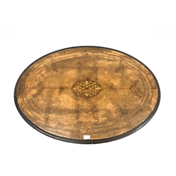 Victorian walnut oval centre table, floral inlaid marquetry to centre encircled by boxwood stringing and chequered lozenge motif, raised on cluster column supports and four splayed leaf carved legs terminating in castors, W102cm