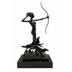 An Art Deco style bronze, after Josef Lorenzl, modelled as a nude female figure holding a bow, with two dogs, signed and with foundry mark, raised upon a rectangular base, overall H35cm 