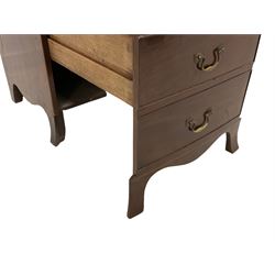 George III mahogany night-cabinet commode, raised gallery enclosing washbasin and bowl rests with removable lid, false frieze drawer over cupboard enclosed by tambour roll door, pull-out commode disguised as two false drawers, on shaped apron with splayed bracket feet 