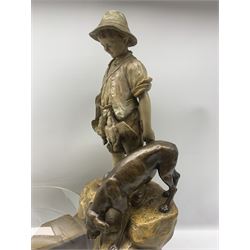 Otto Petri (German 1860-1942): For Goldscheider painted terracotta centrepiece with large glass bowl, modelled as boy with dog, mounted on rock formation, signed 'Petri' impressed with factory mark H62cm