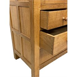 Mouseman - oak tallboy chest, fitted with two cupboards above two short and two long drawers, carved Mouse signature, by the workshop of Robert Thompson, Kilburn