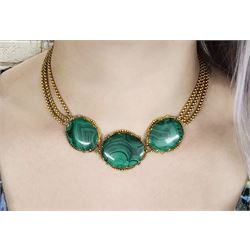 Early 20th century 18ct gold malachite necklace, three oval malachites, with yellow gold beaded border, to an 18ct gold three strand chain necklace