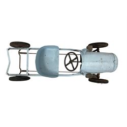 1930s blue painted pedal car or commercial lorry, with steel body and chassis, metal steering wheel and grill, wooden side lights and red painted disc wheels, L119cm, W48cm, H52cm