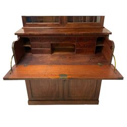 Early Victorian mahogany bookcase secretaire, the projecting cornice over two astragal glazed doors, enclosing three adjustable shelves, the lower section fitted with fall front secretaire drawer revealing small drawers, figured panelled double cupboard below, on plain plinth base
