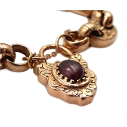 9ct gold fancy link bracelet, engraved foliate decoration, with heart locket set with a cabochon garnet, stamped 