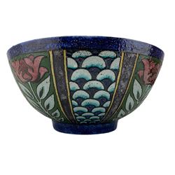 Charlotte Rhead bowl, having stylized tube lined decoration, the exterior decorated with alternate panels of Art Nouveau style flowers and scale pattern, the interior decorated with a fish leaping from the choppy waters, signed L Rhead (Lottie Rhead), no factory marks, possibly an experimental piece, D28cm x H14cm 