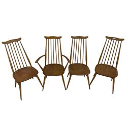 Ercol - set four (3+1) mid-20th century elm and beech 'Goldsmith Windsor Chairs', yoke top over high spindle back with tapering supports