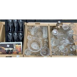 Three boxes of glassware including a set of six cased wine glasses, decanters vases etc 