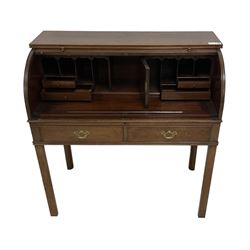 George III mahogany roll-top bureau, the tambour roll encosing sliding writing surface and fitted interior with pigeonholes and correspondence drawers, over two cock-beaded drawers, on square supports with inner chamfer