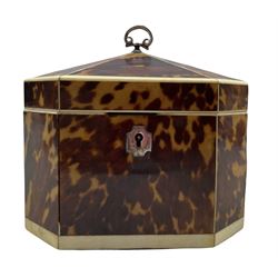 Early 19th century tortoiseshell tea caddy of octagonal design, inlaid with ivory stringing and with pagoda cover W13cm