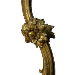 19th century wall mirror in Florentine giltwood and gesso frame, pierced c-scroll cartouche pediment decorated with flower heads, the scrolling foliage moulded frame decorated with flowers, terminating to shell and leaf motifs 