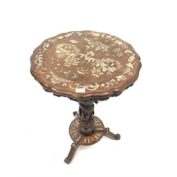  Early 20th century Chinese hardwood occasional table, the top with bone inlay over turned column decorated with carved dragon, raised on triple splay supports, D55cm  