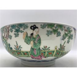 20th century Chinese polychrome decorated bowl with panels of figures in a garden, floral interior D27cm