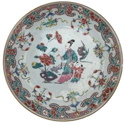 18th century Chinese famille rose circular dish, enamelled with a mother and child in a garden setting, D22cm. Provenance: From the Estate of the late Dowager Lady St Oswald
