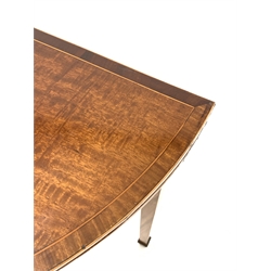 Georgian mahogany demi-lune fold over card table, the crossbanded top lifting to reveal baize lined playing surface, raised on square tapered supports  