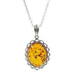 Silver oval Baltic amber pendant necklace, stamped 925