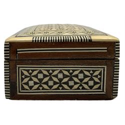 Burmese red lacquer circular box with internal tray, the cover with elephant and mahout D19cm, Indian rectangular box inlaid with mother of pearl W13cm and part of a carved wood Tibetan frieze carved with a peacock W15cm (3)