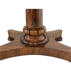 William IV rosewood centre table, rectangular top fitted with two mahogany lined drawers, raised on a tapered column with moulded lappet collar, on a quadruform platform base terminating in lappet carved feet with castors