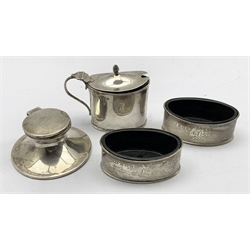 Silver navette shape three piece condiment set engraved with initial 'D' Birmingham 1913/14 Maker William Aitken and a small silver capstan inkwell Birmingham 1915