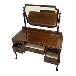 20th century mahogany dressing table, the adjustable mirror back over one long and four short drawers, raised on cabriole supports W131cm, H156cm, D58cm