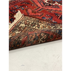  Red ground hand knotted Persian Hamadan rug with geometric design on red field, 102cm x 212cm  