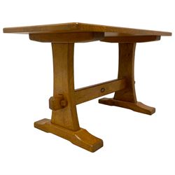 Acornman - oak coffee table, rectangular top on shaped end supports united by pegged stretcher, on sledge feet, carved with acorn signature, by Alan Grainger, Brandsby, York 