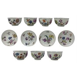Set of seven 18th century Meissen tea bowls with four saucers, each hand painted with botanical studies within chocolate rims, blue crossed swords marks beneath, saucer D8cm (11) Provenance: From the Estate of the late Dowager Lady St Oswald