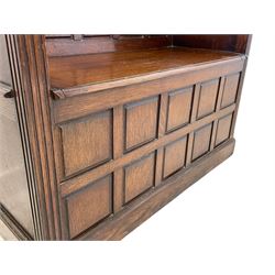 Edwardian oak hall bench, dentil cresting rail over panelled back and hinged box seat, fluted uprights, panelled front, on plinth base