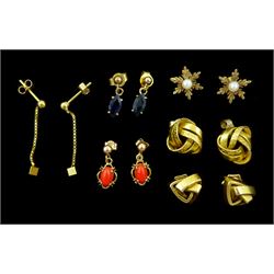 Six pairs of 9ct stud earrings, including two fancy knot pairs, pearl snowflake, coral, sapphire and chain earrings