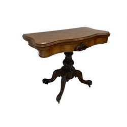 Victorian walnut serpentine games table, fold over top