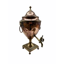 Early 19th century copper tea urn with lion mask ring handles, brass tap and square base H45cm