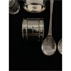 Three John Pinches silver Christmas spoons, silver vesta case Chester 1902, two silver serviette rings and a small glass toilet bottle with silver cover 5.6oz