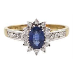 9ct gold oval sapphire and diamond cluster ring, with diamond set shoulders, hallmarked