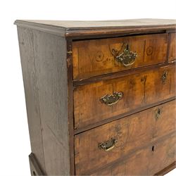 18th century figured walnut straight-front chest, rectangular top with crossbanding and moulded edge, fitted wit two short and three oak lined drawers, the fronts bookmatched with crossbanding and brass handles, raised on bracket feet